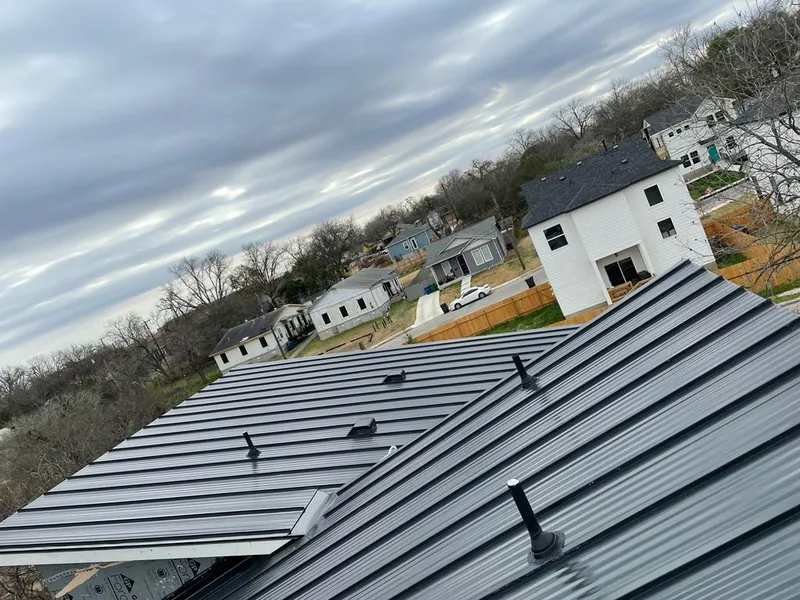 Standing seam metal roof panels with vents for Skylight Repair in St. Louis